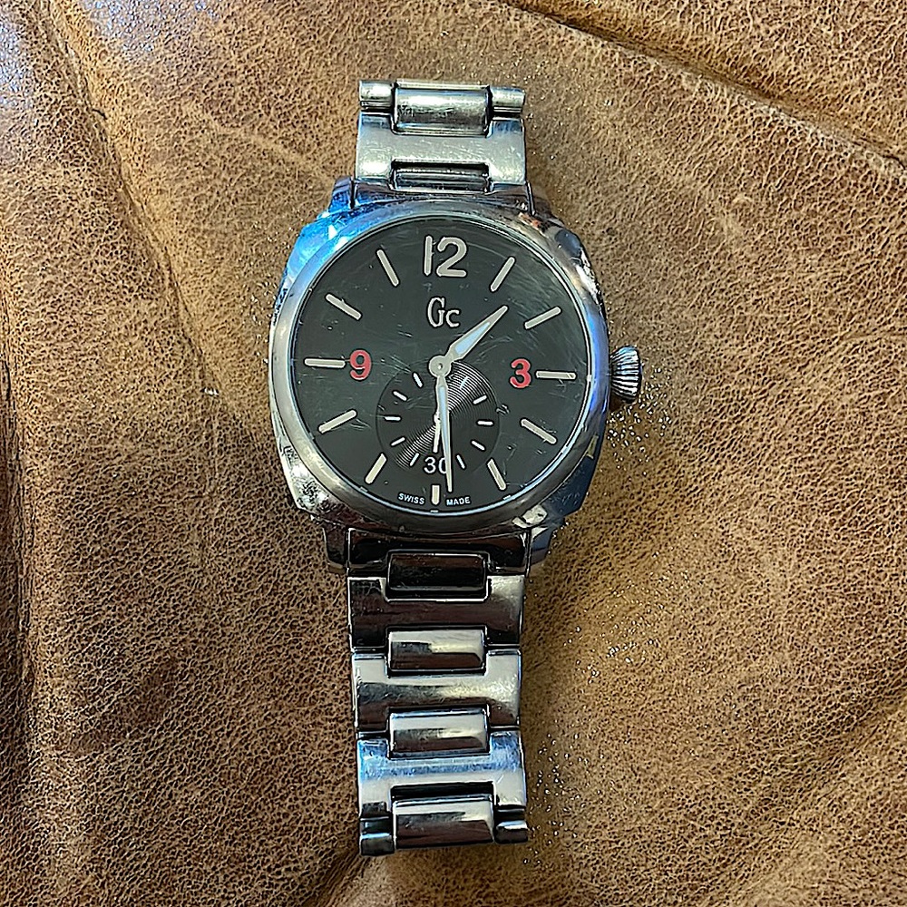 Guess collection watch … bought in 2010-12? Still runs and keeps time